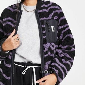 Carhartt WIP zip front fleece jacket in wave print with contrast pocket